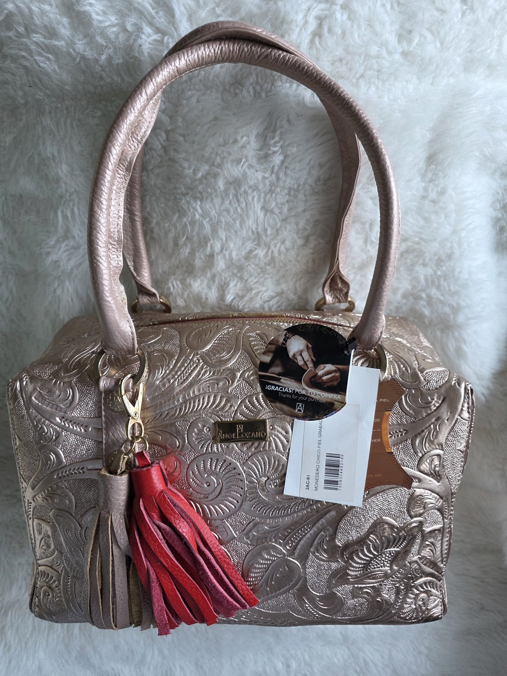 Angelozano Leather Embossed Metallic Pastel Pink Satchel with Red Tassel Accent